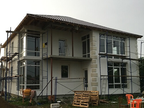 Отделка фасада дома штукатуркой в Столбцах